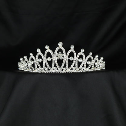 Classic openwork crown with graduated arches and refined crystal embellishments