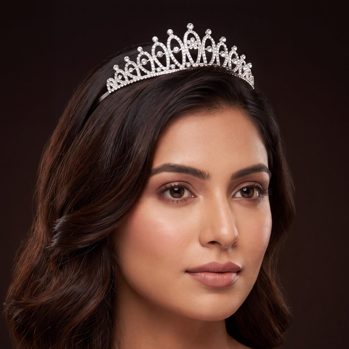 Classic openwork crown with graduated arches and refined crystal embellishments