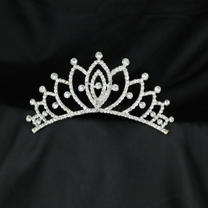 Regal lotus inspired crown with symmetrical arches and refined stone accents
