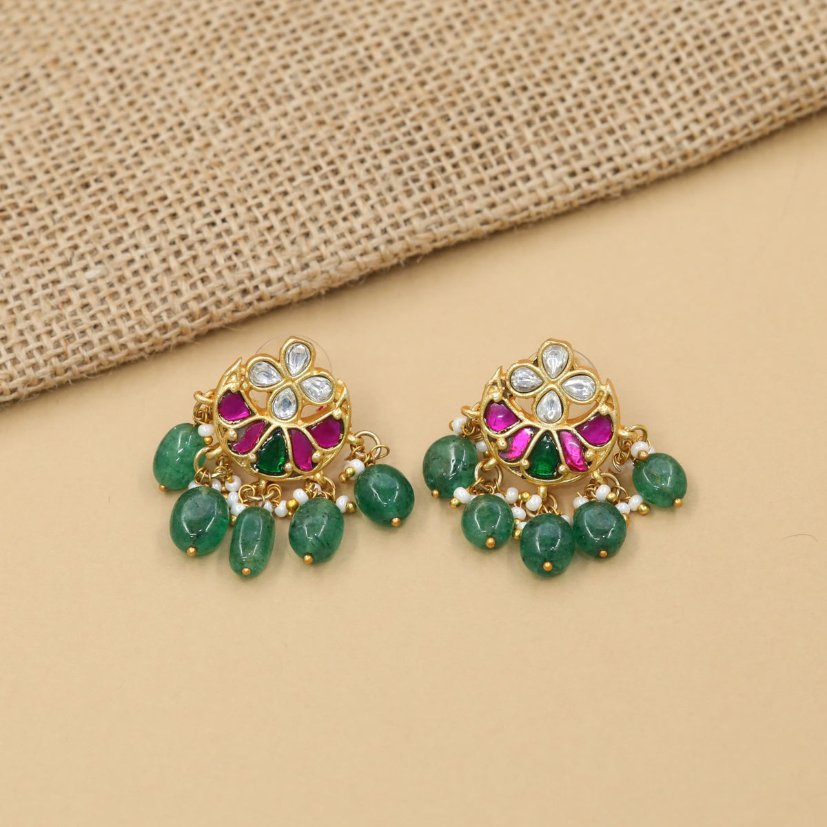 Grand jadau stud featuring an elaborate floral design and cascading beadwork