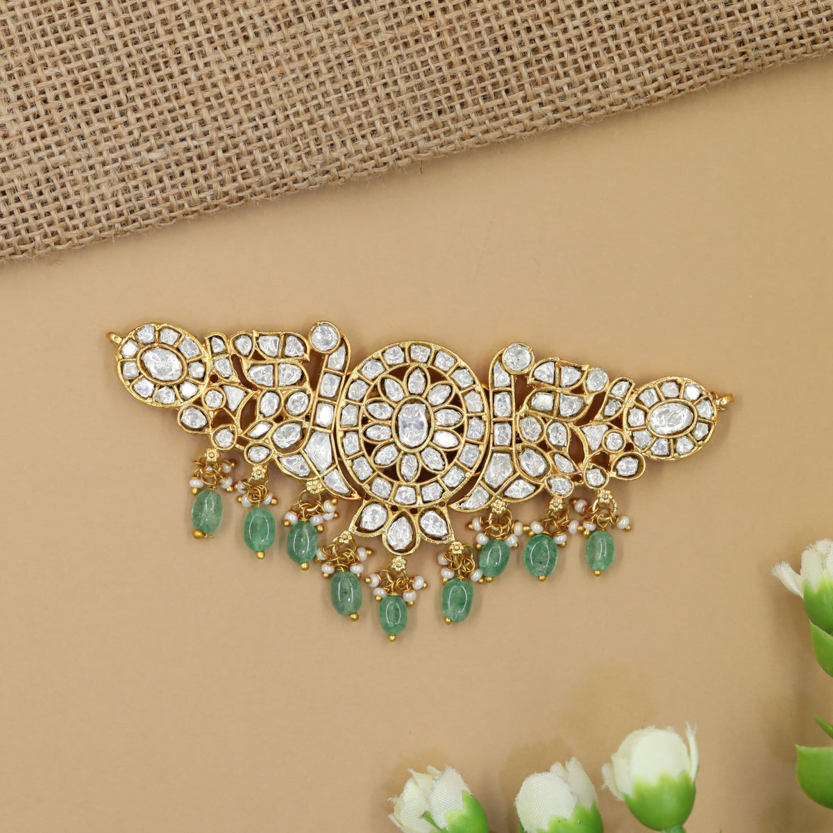Jadau choker with ornate circular centrepiece and cascading bead drops