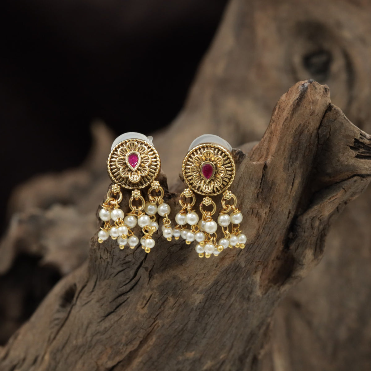 Antique Stud With Intricate Floral Scrollwork