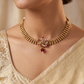 Signature Kundan Choker Necklace With Ruby Floral Elements And Gold Texture Design