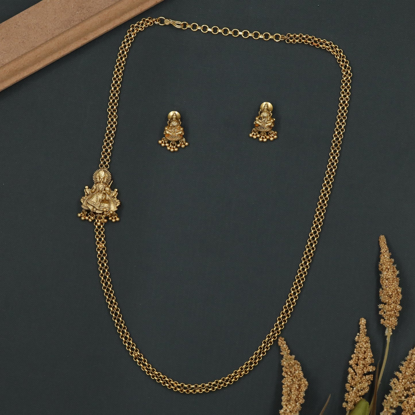 Seated Lakshmi Chain with Sculpted Figurative Pendant