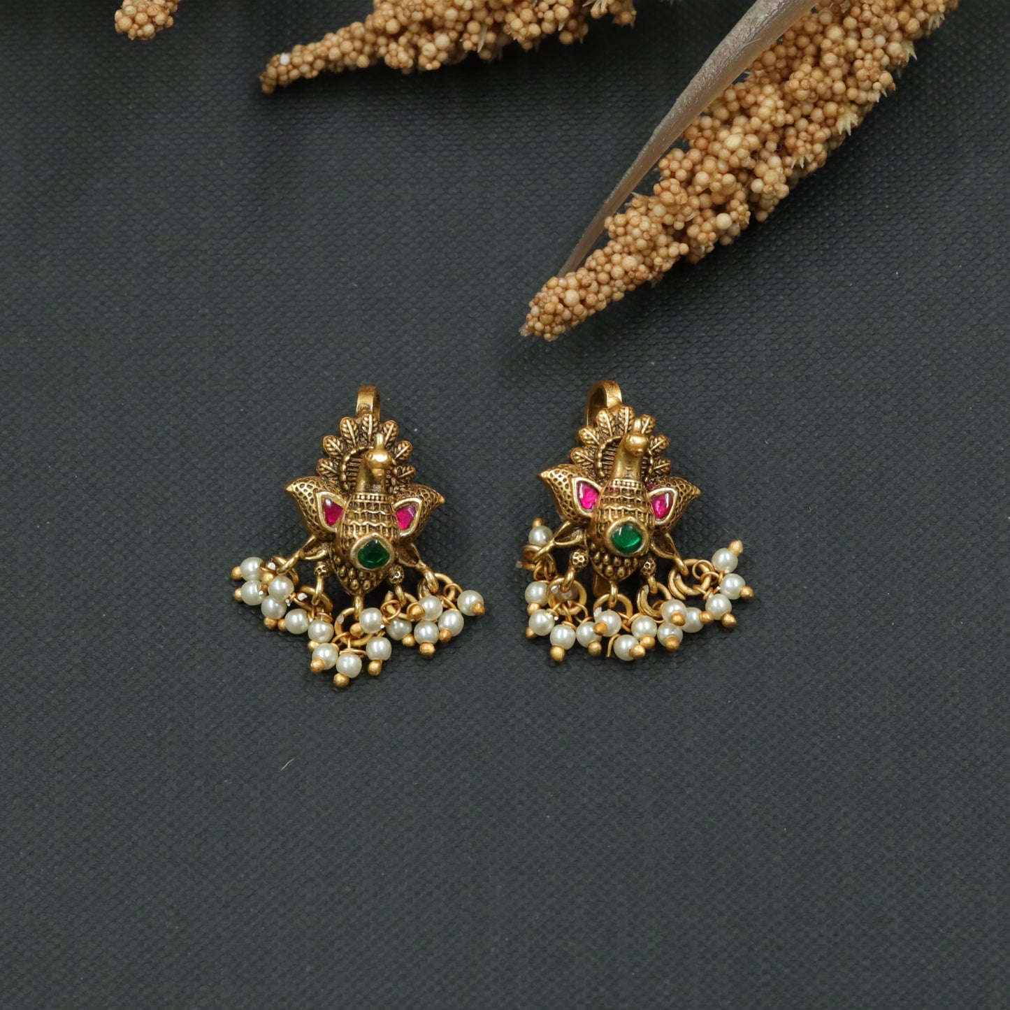 Antique-Inspired Peacock Bugadi with Dangling Finish