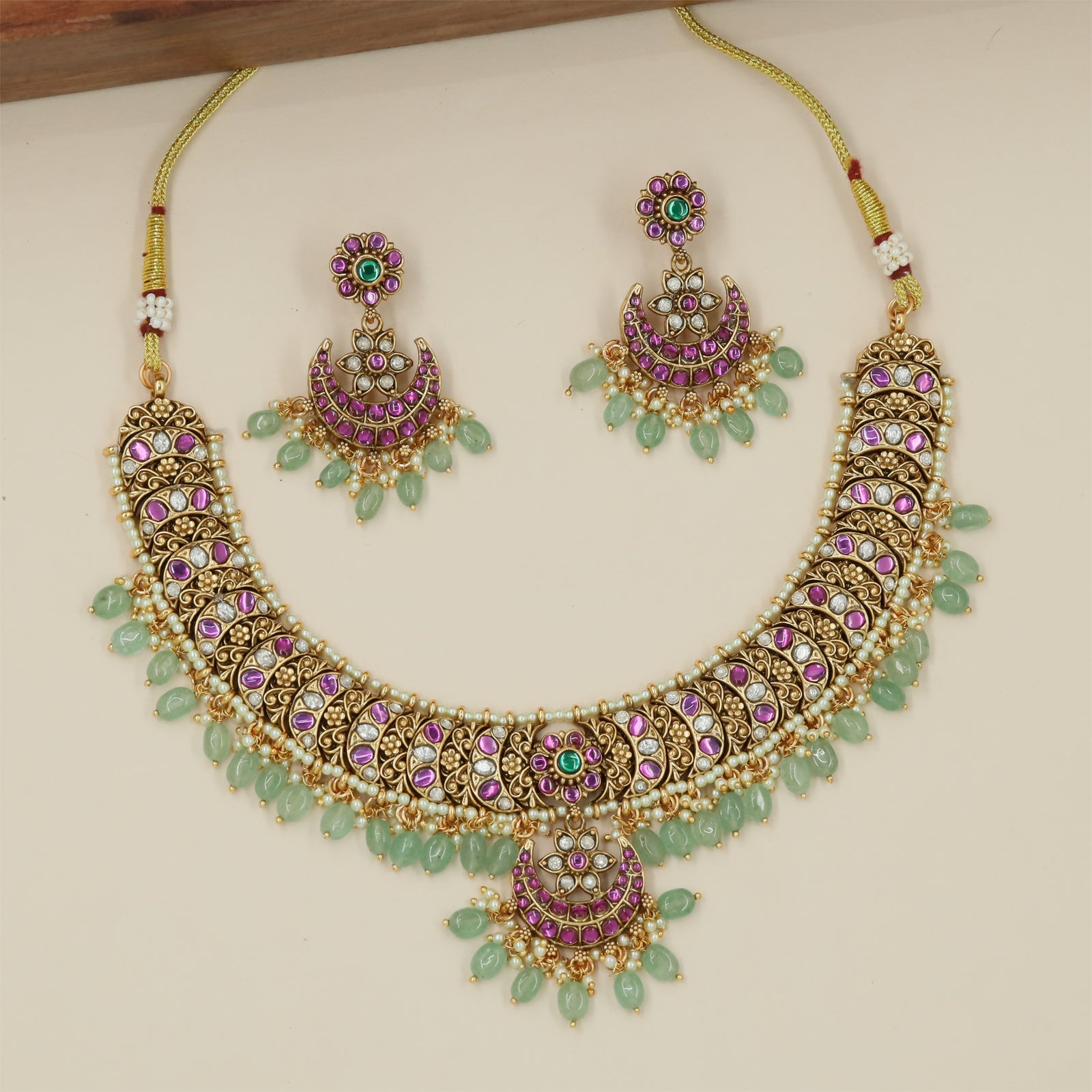 Royal Designer Necklace with Layered Border Rows and Ornamental Pendant Work