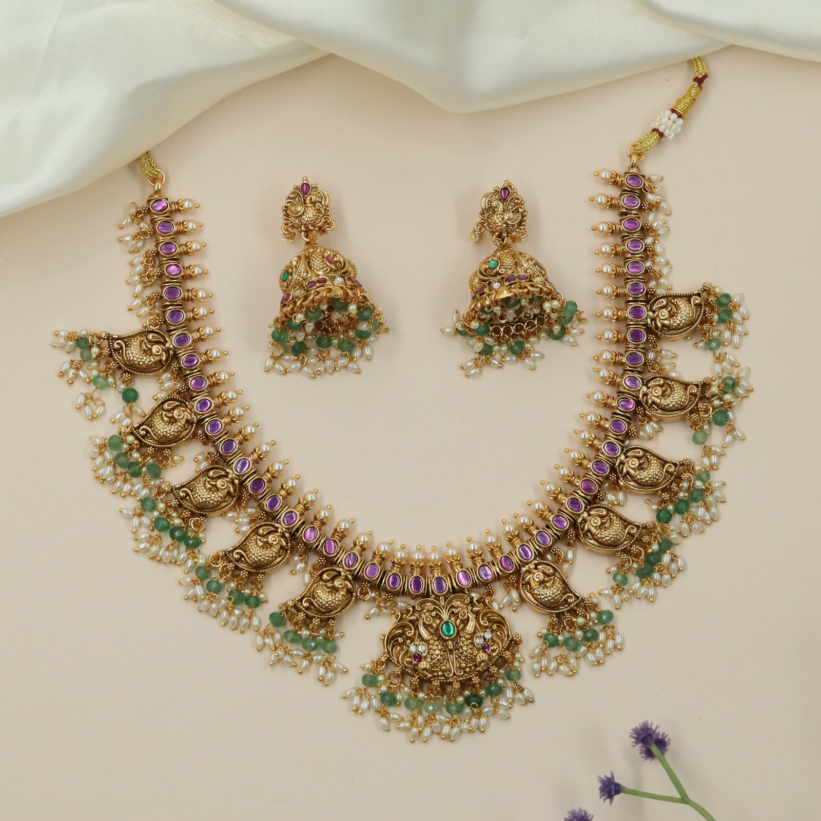 Heritage peacock ornamental necklace with continuous filigree arrangement