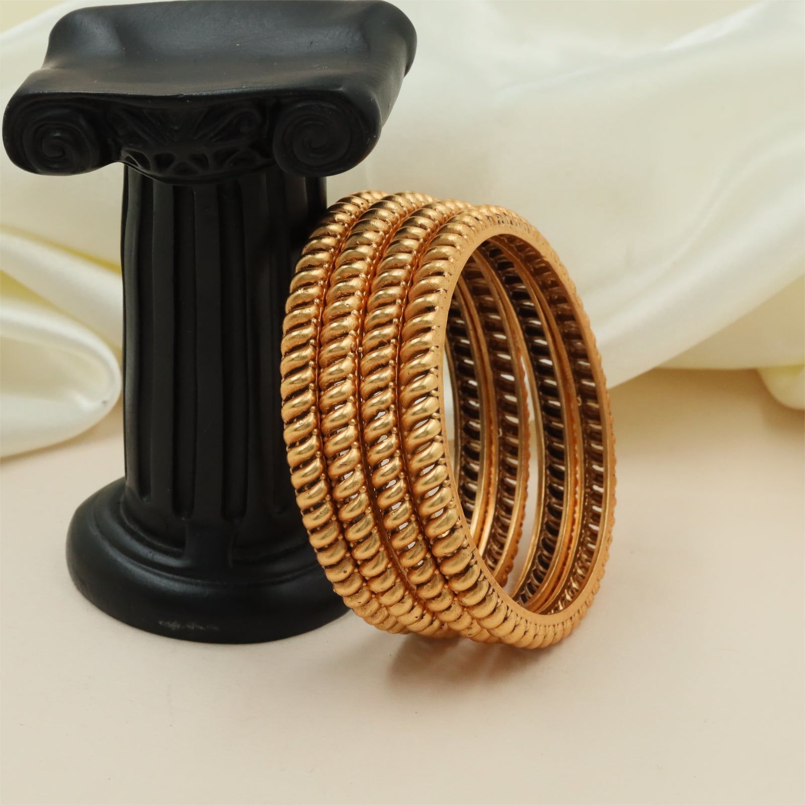 Ribbed frame textured antique gold bangles