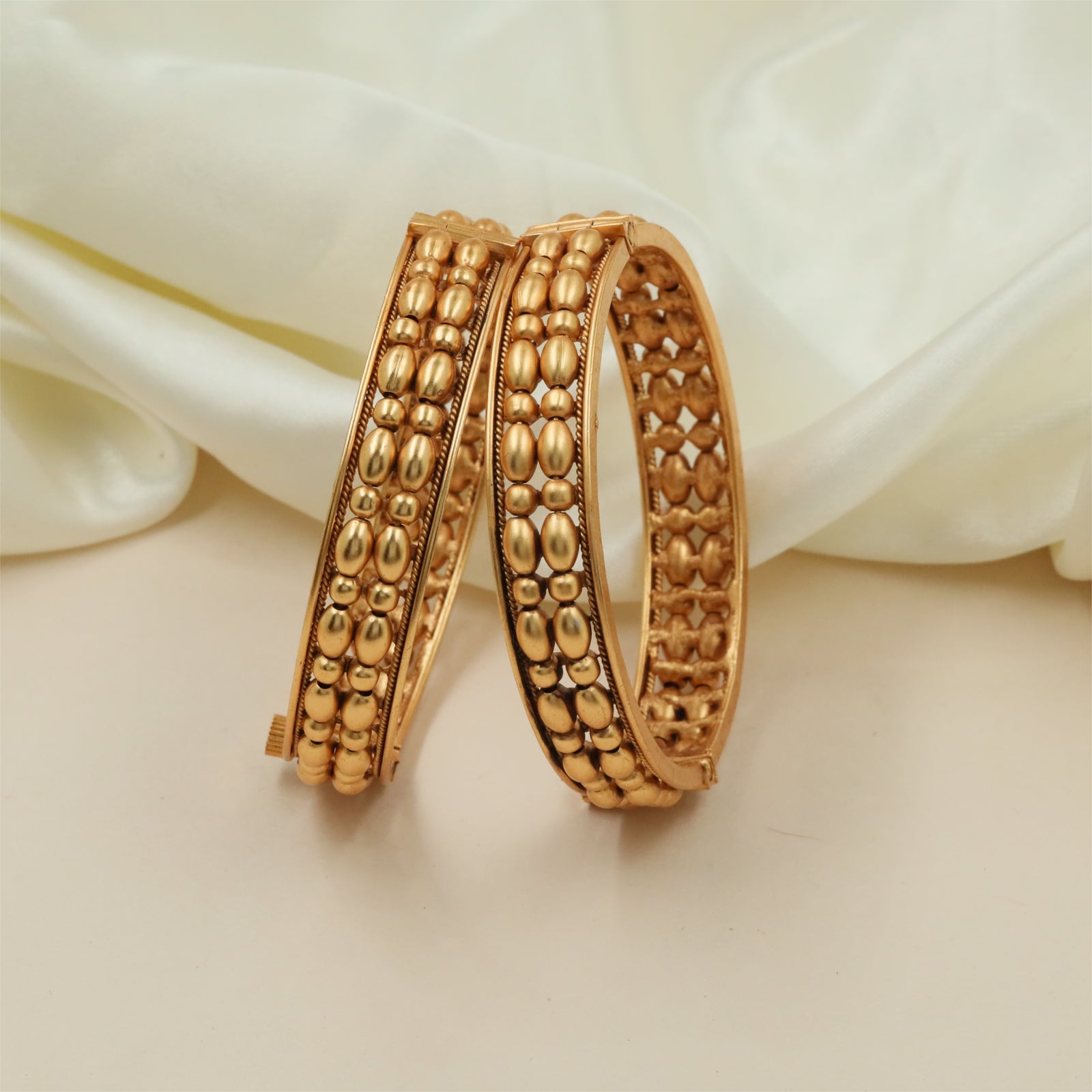Designer Circular Detail Bangles with Structured Border Finish