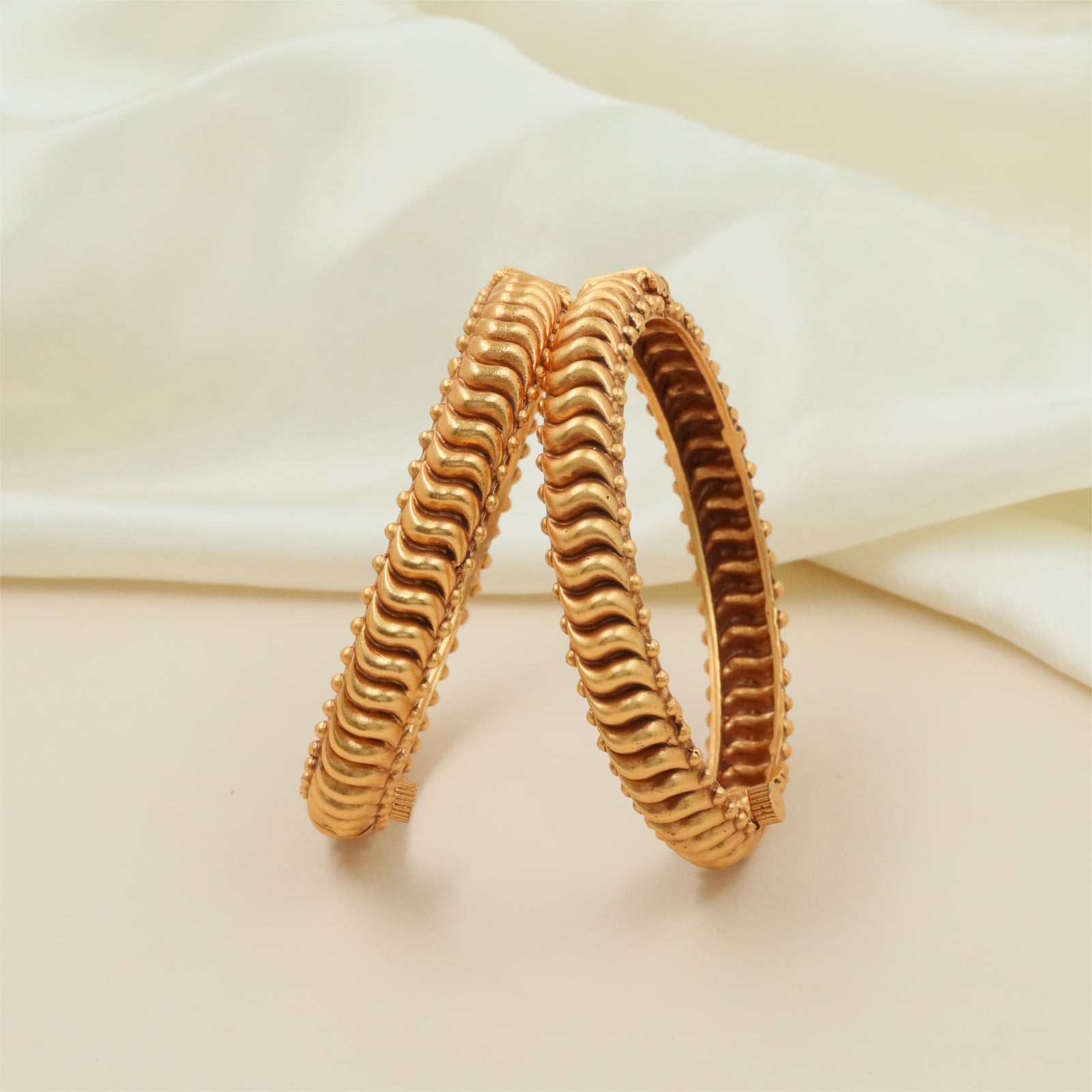 Designer Curved Frame Bangles with Ornamental Surface Work