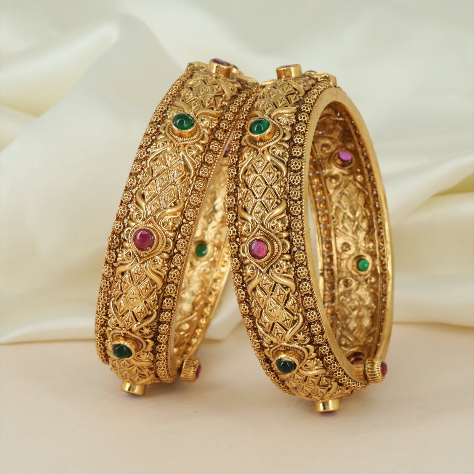 Signature Curve Antique Bangles with Floral Carving and Structured Edges