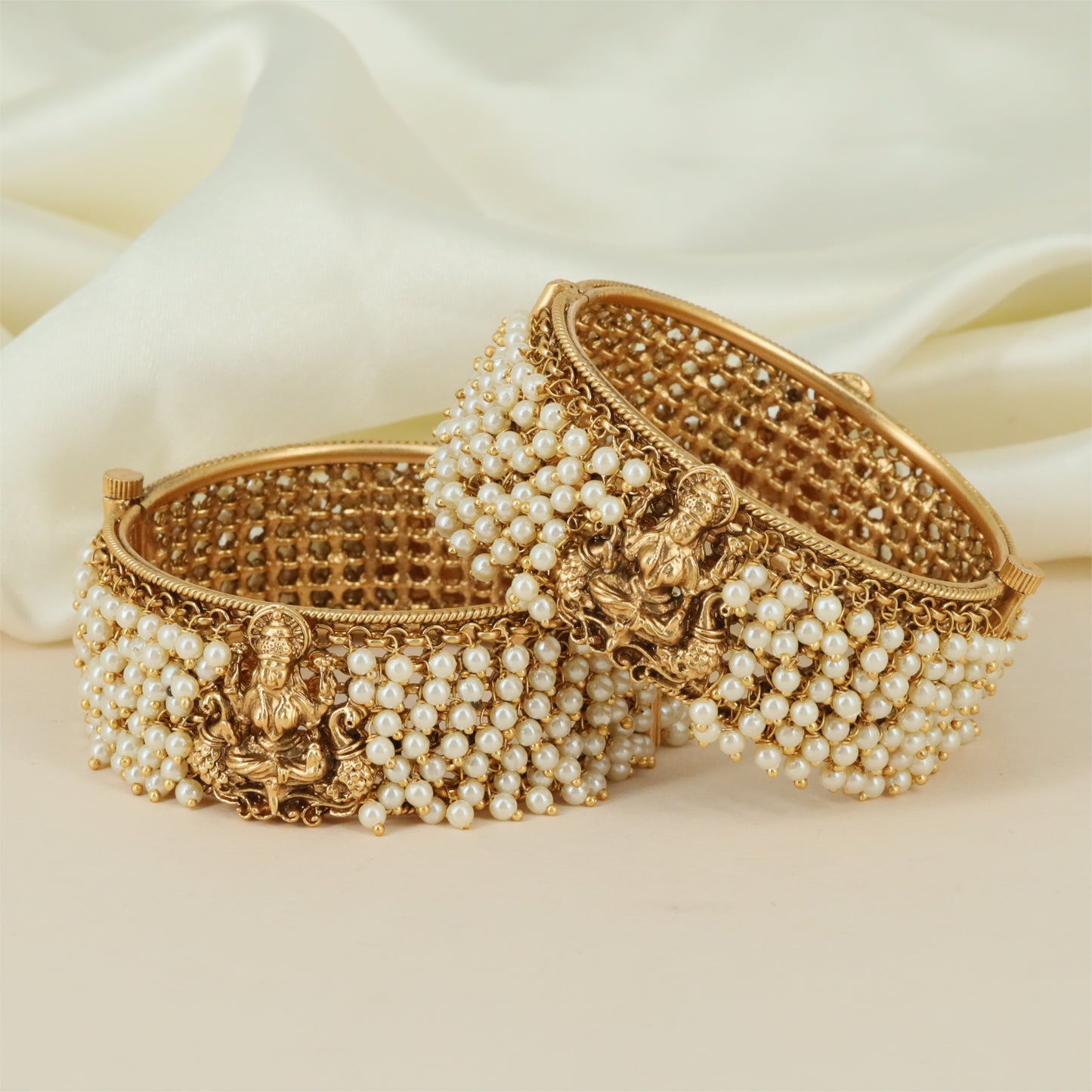Eshana Lakshmi Antique Bangles with Goddess Carving and Pearl Cluster Finish