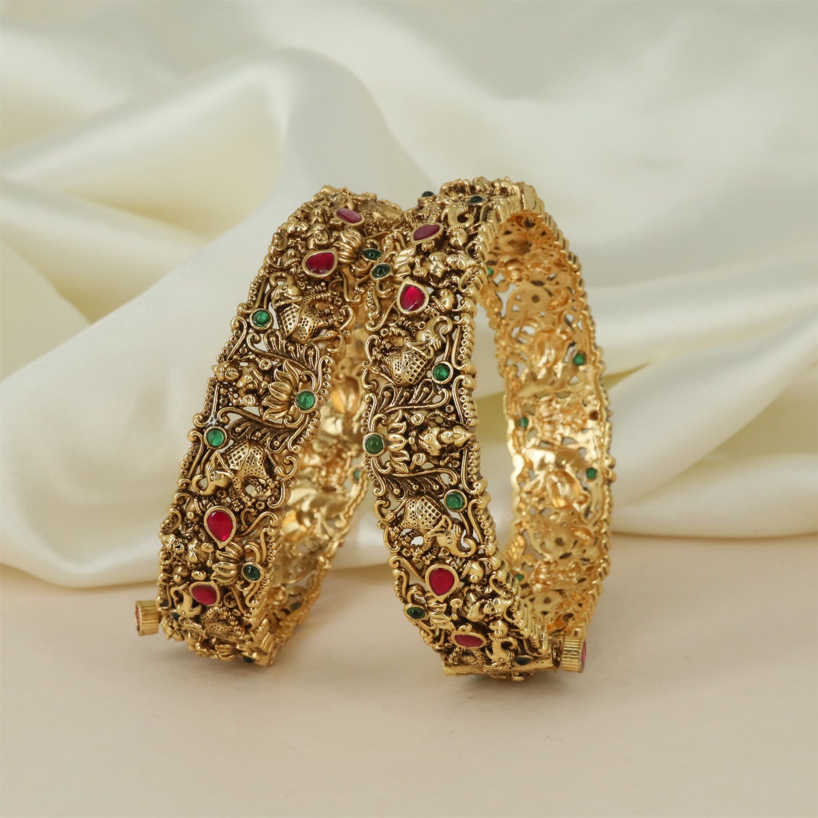 Drapeleaf Antique Bangles with Openwork Detailing and Structured Side Borders