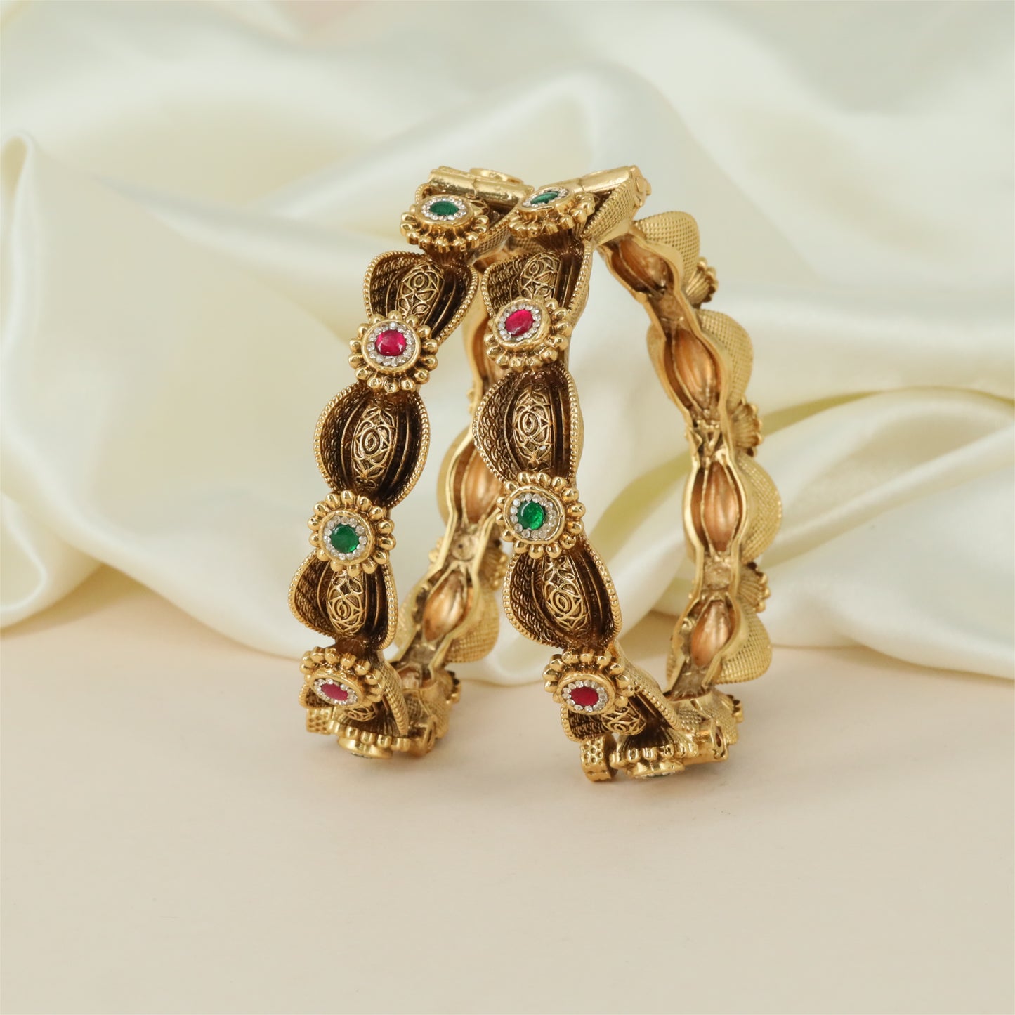 Glorique Antique Bangles with Openwork Oval Panels and Raised Floral Detailing