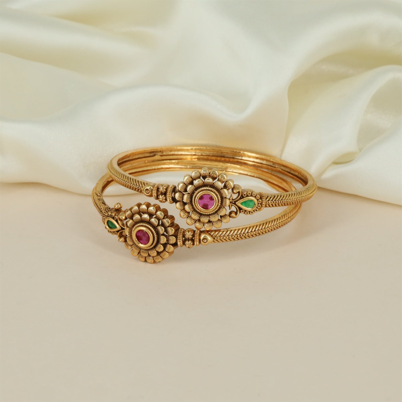 Temple Rope Antique Bangles with Floral Round Frames and Twin Border Detailing