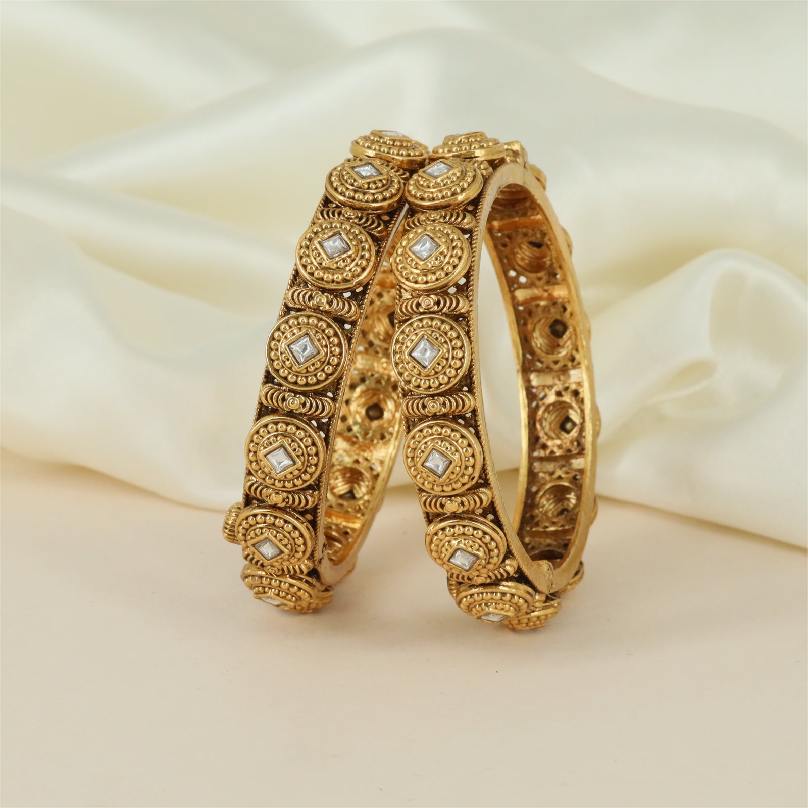 Heritage Disc Antique Bangles with Raised Circular Frames and Rope Borders