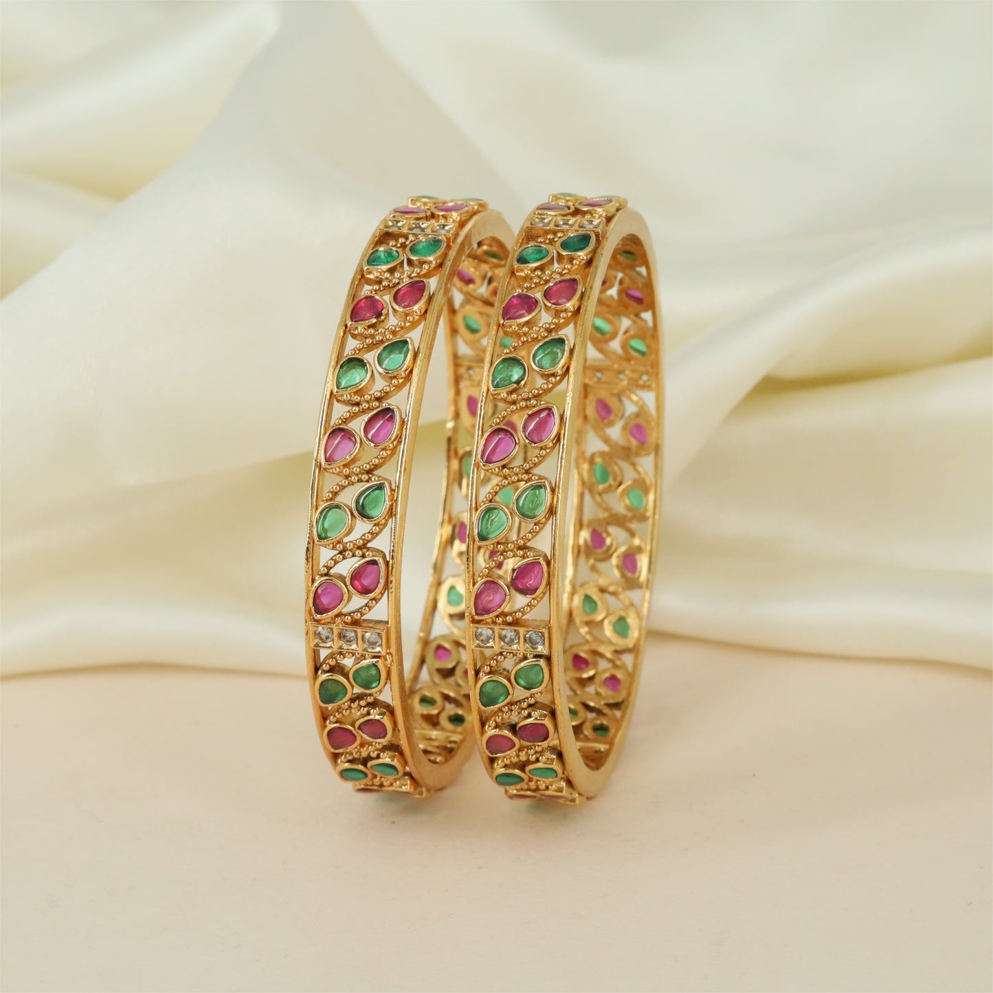 Temple Frame Antique Bangles with Repeating Leaf Motifs and Grid Texture