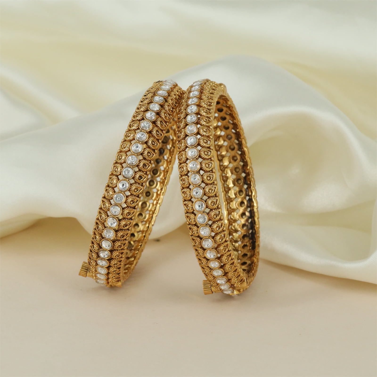 Grid Curve Antique Bangles with Raised Circular Frames and Side Carving