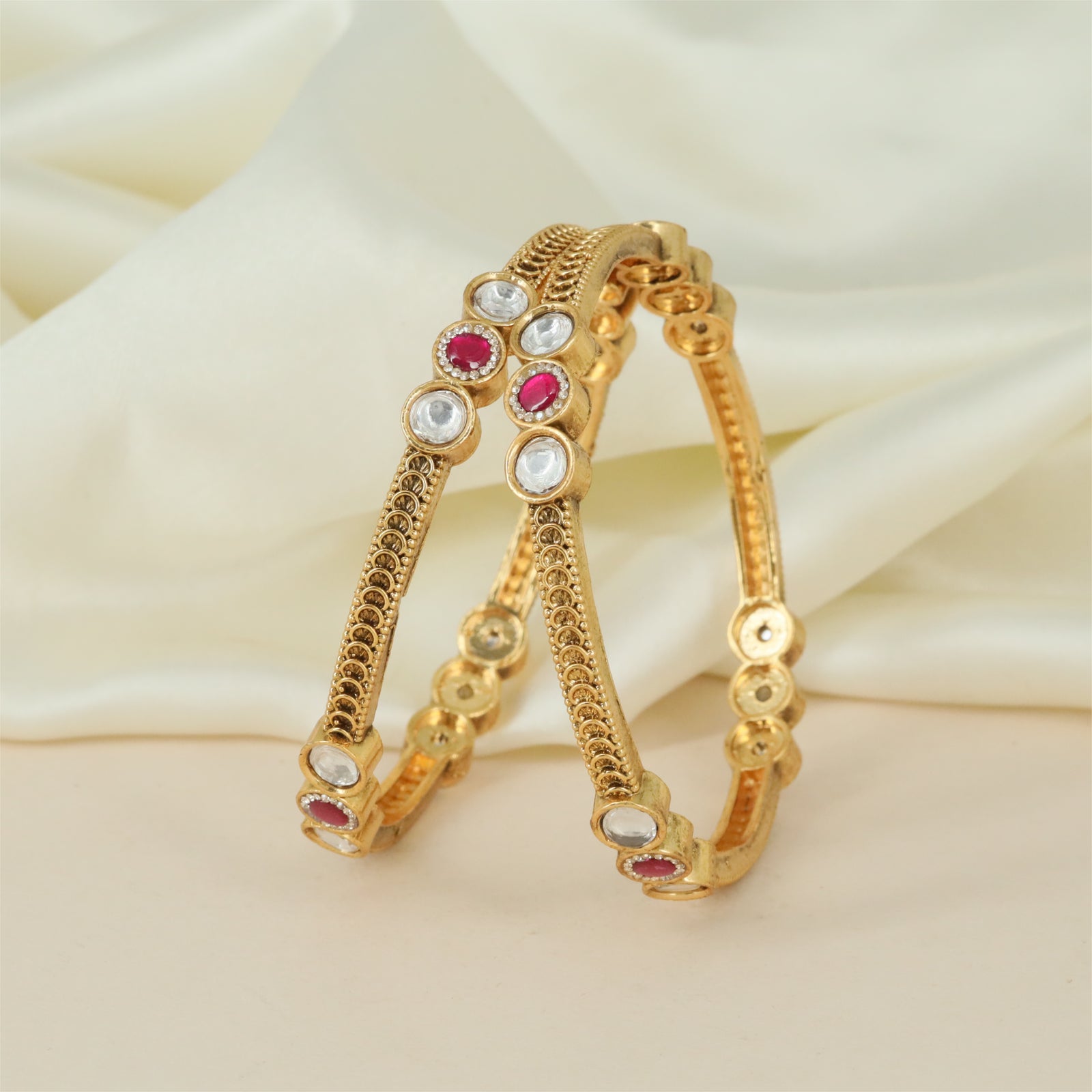 Ornamental Curve Antique Bangles framed by Circular Arrangements