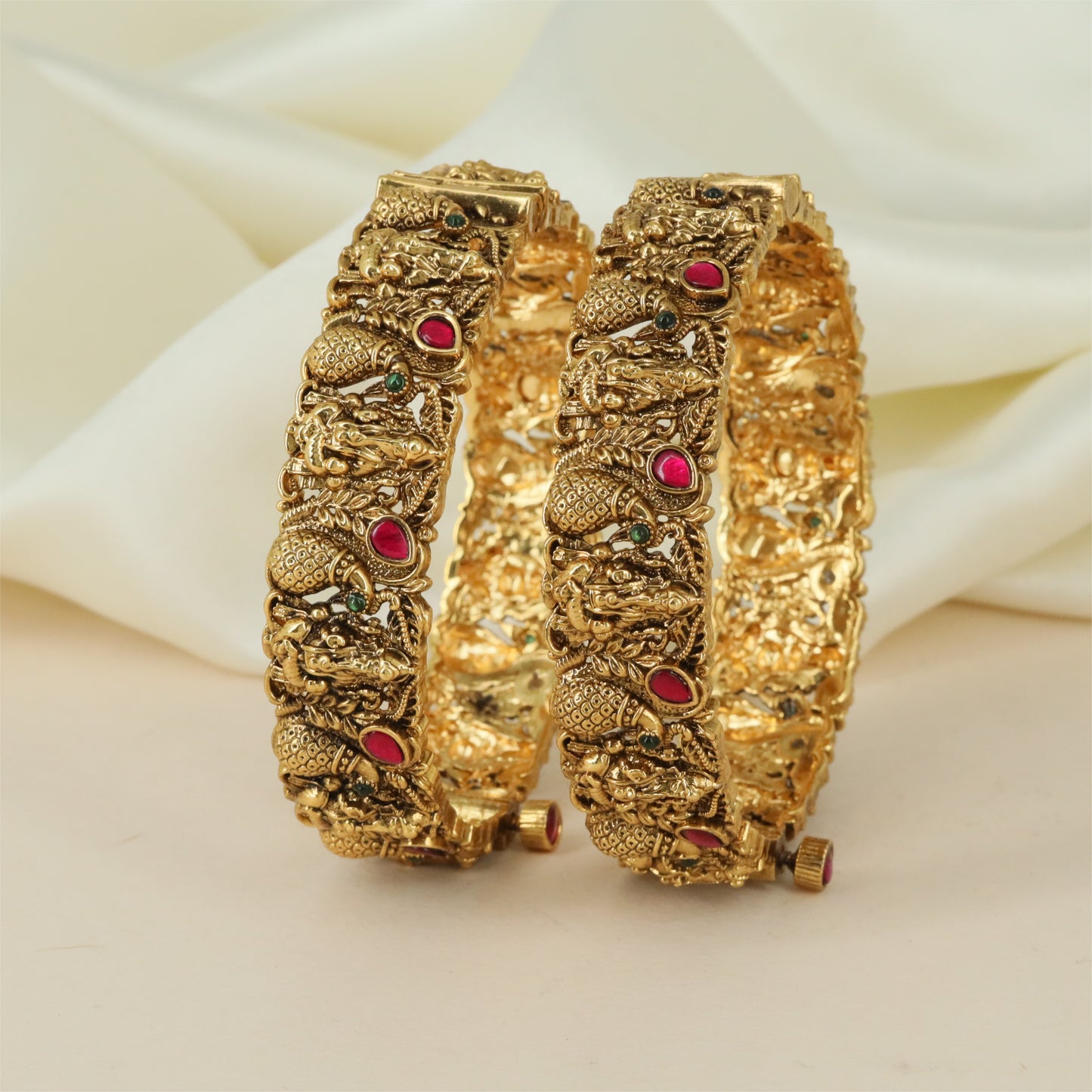 Cultural Temple Bangles featuring Lakshmi and Peacock Composition