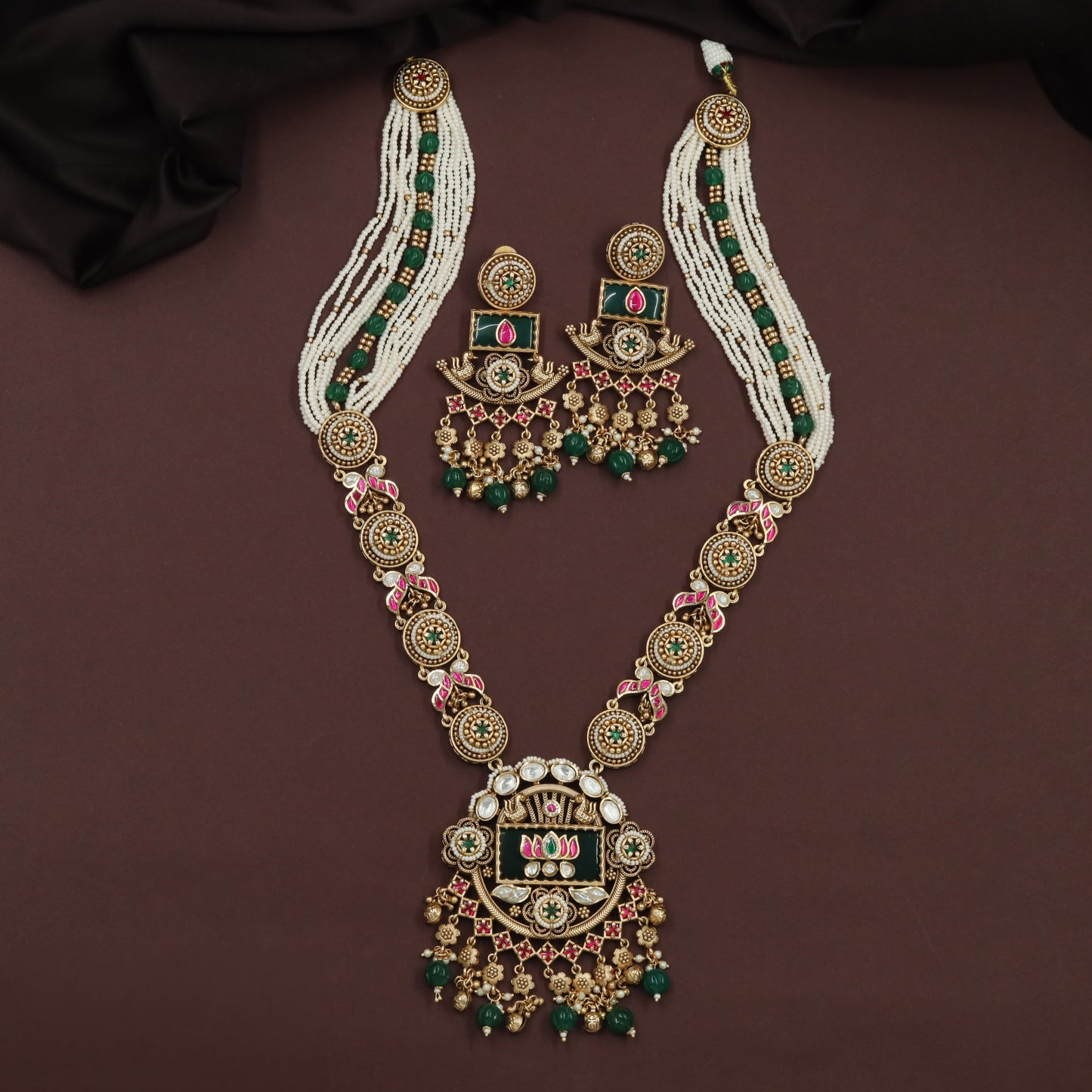 Kundan long haara with circular medallion links and multi strand beadwork