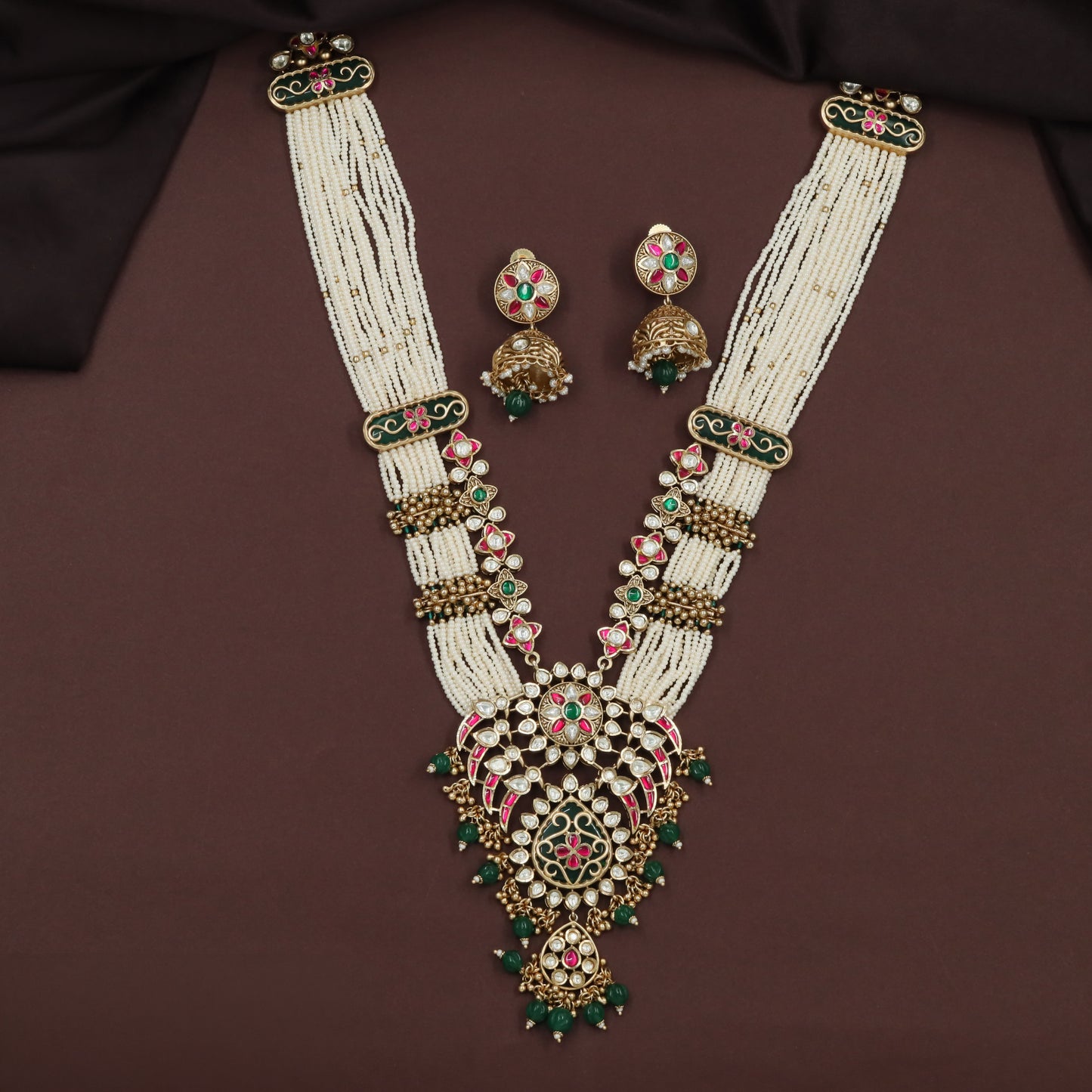 Kundan Long Haara with Curved Link Panels and Decorative Drop Pendant