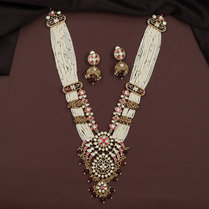 Kundan Long Haara with Curved Link Panels and Decorative Drop Pendant