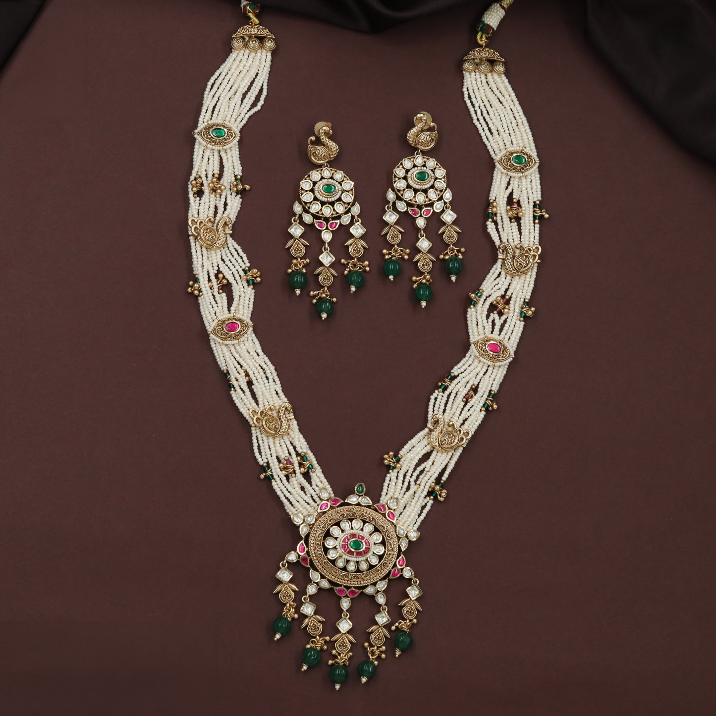 Kundan long haara with repeated oval accents and graduated pendant details