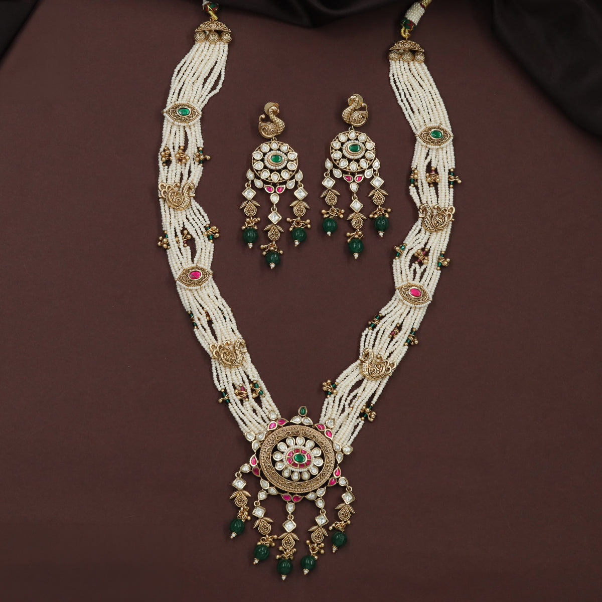 Kundan long haara with repeated oval accents and graduated pendant details