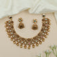 Dewline Floral Kundan Necklace with Hanging Ball Tassels