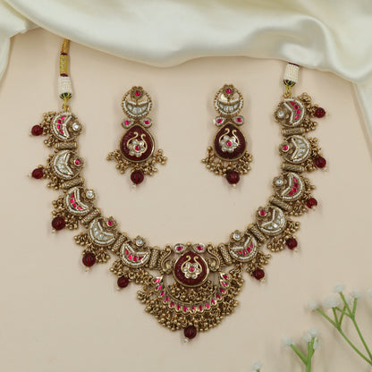 Signature Mesh Kundan Necklace with Structured Moon Pattern and Fringe Drops