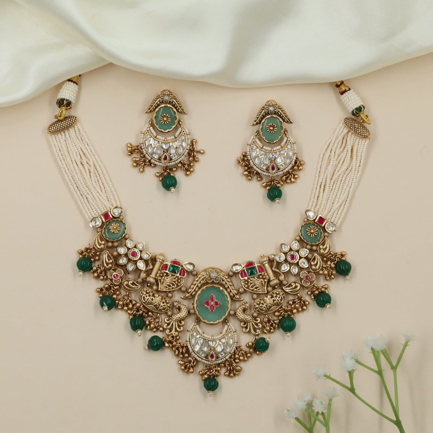 Grid Bird Kundan Pearl Choker with Hanging Ball Tassels