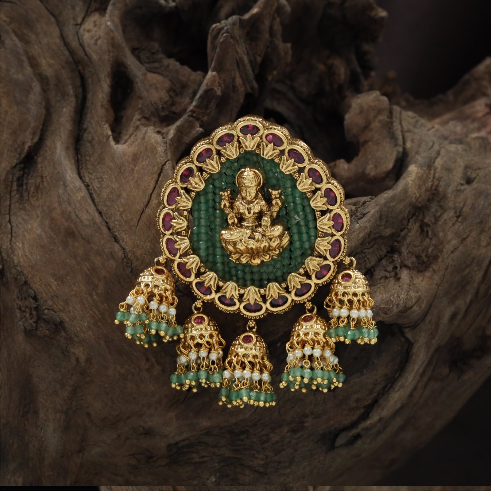 Antique jade bille with Lakshmi centerpiece