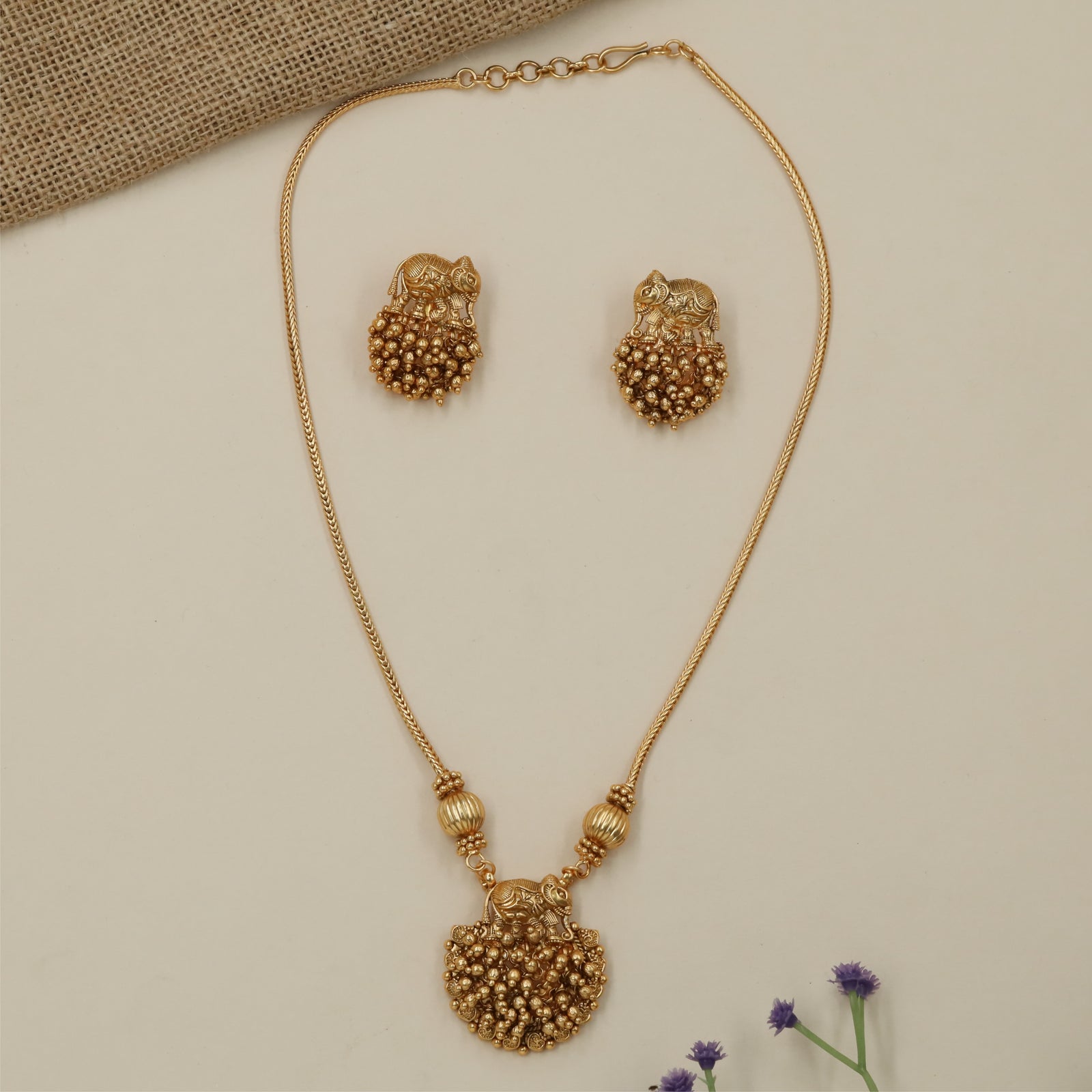 Manasvini Elephant Carving Antique Necklace with Decorative Fringe Finish