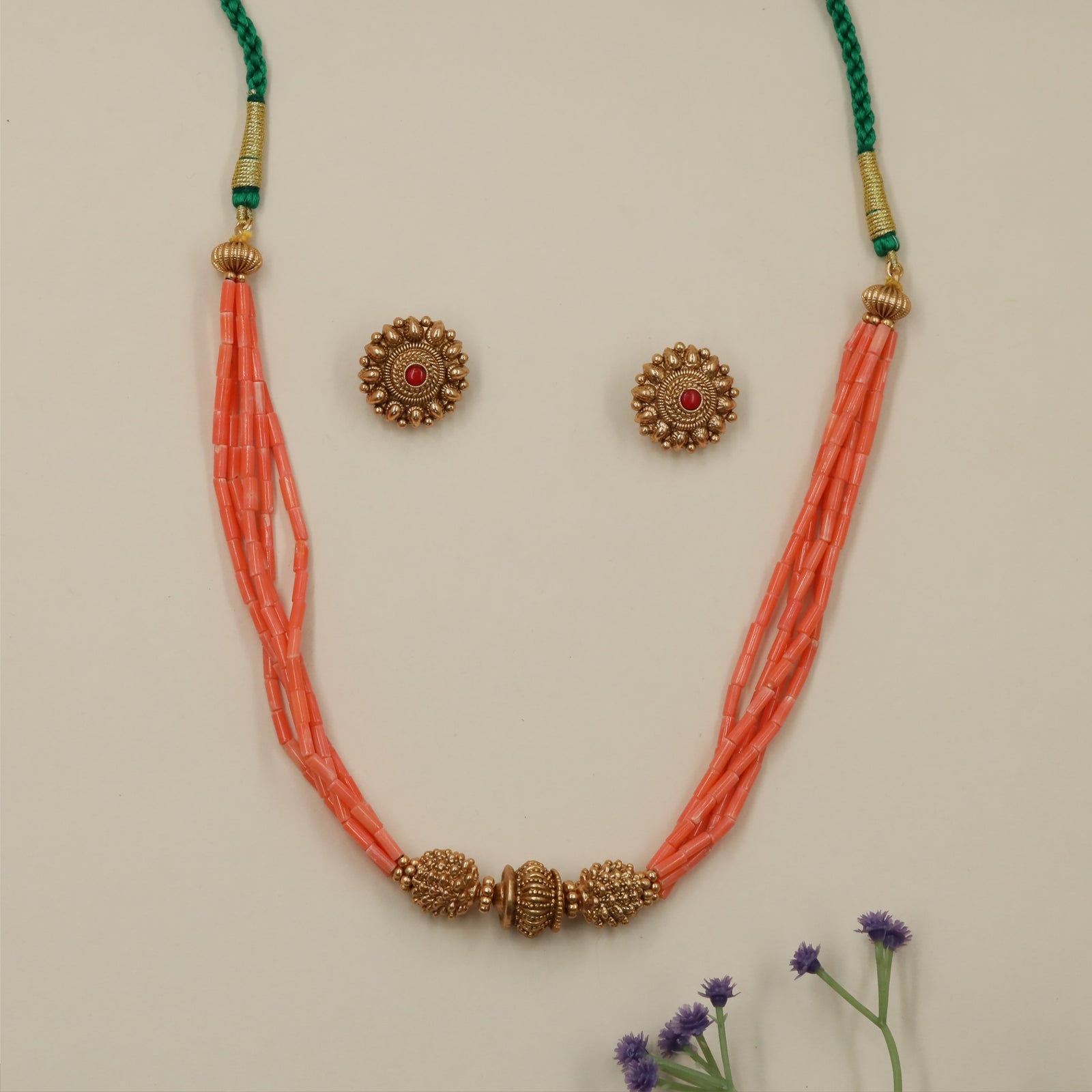 Regal ceremonial beads necklace with decorative motif detailing