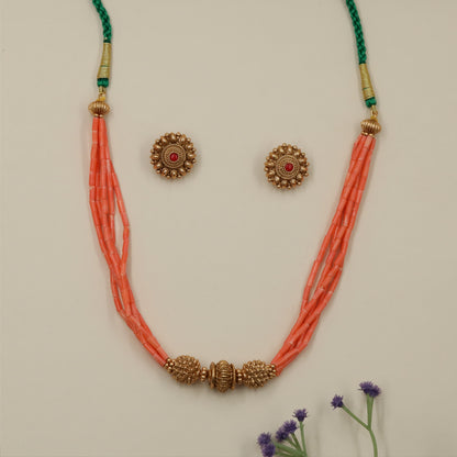 Regal ceremonial beads necklace with decorative motif detailing