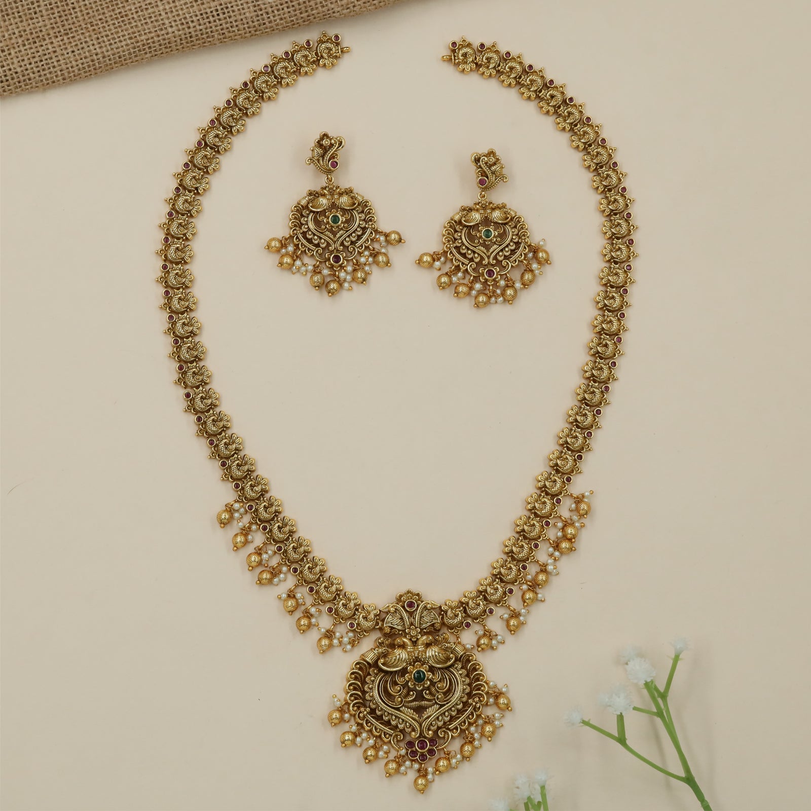 Opulent Floral Scroll Antique Long Haara with Sculpted Border Work