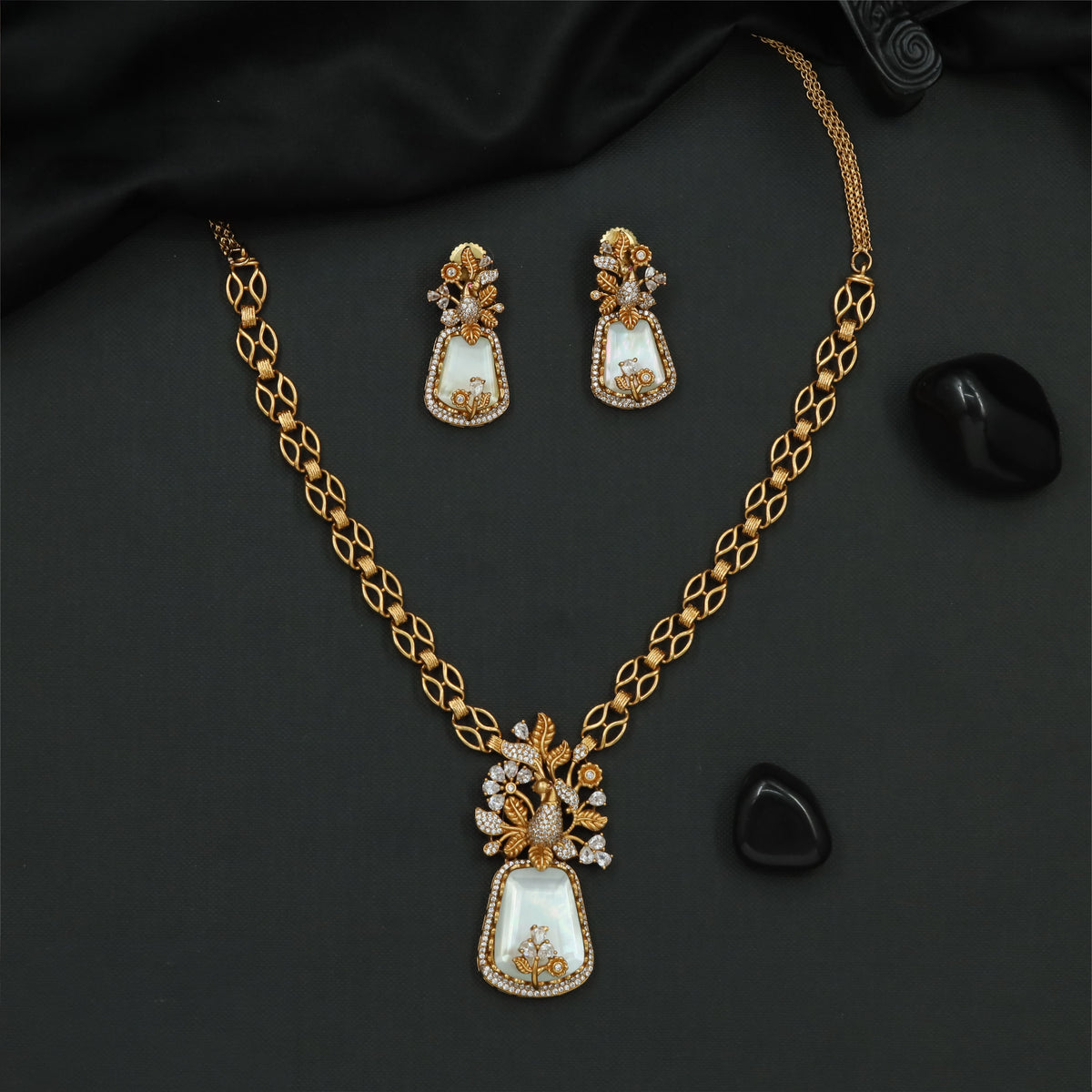 Rose Gold Necklace featuring an openwork chain and a framed pendant