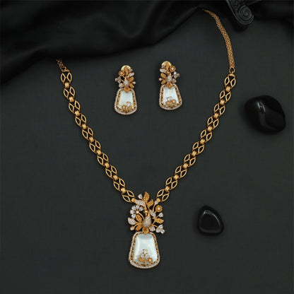 Rose Gold Necklace featuring an openwork chain and a framed pendant