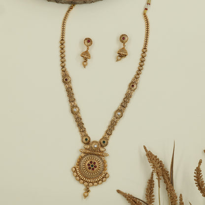 Granulated bead long haara with textured links and ornate medallion pendant with hanging drop