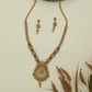 Grid disc long haara with compact links and central drop pendant