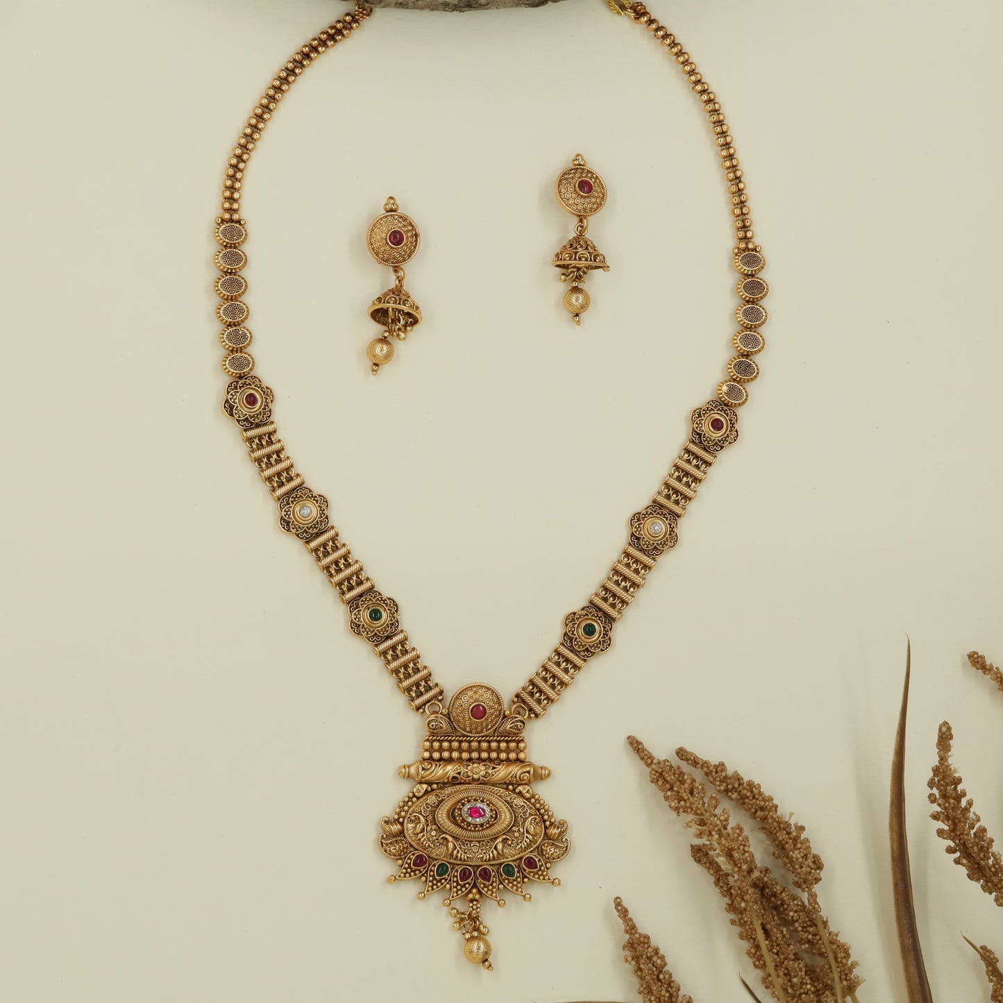Halo disc antique long haara with circular panels and hanging drop