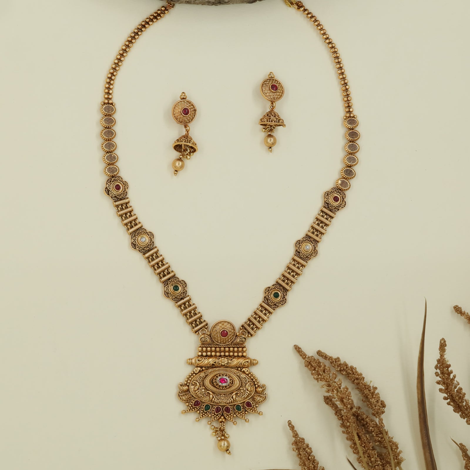 Halo disc antique long haara with circular panels and hanging drop