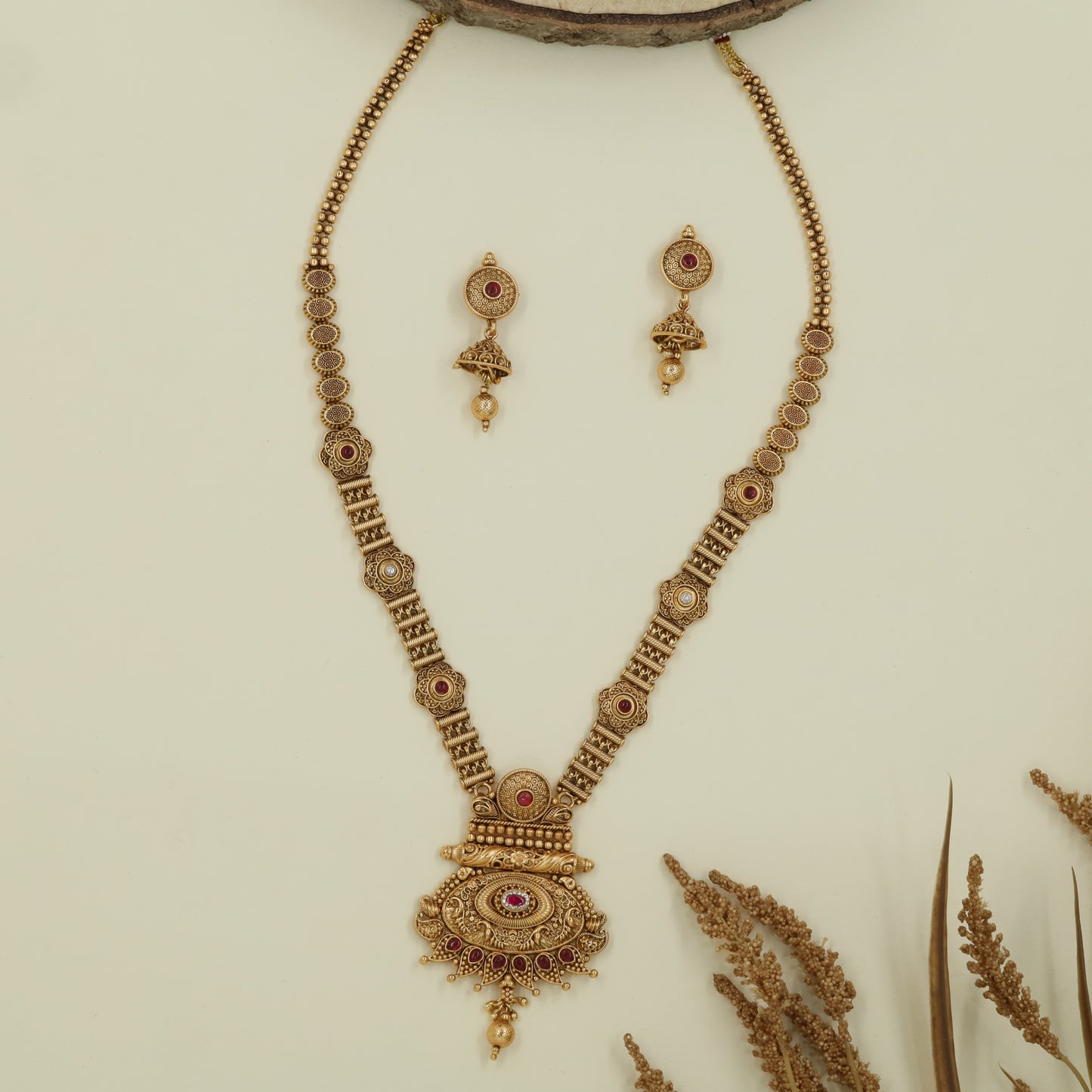 Halo disc antique long haara with circular panels and hanging drop