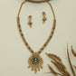 Honeycomb link long haara with patterned connectors and peacock pendant with drop fringe