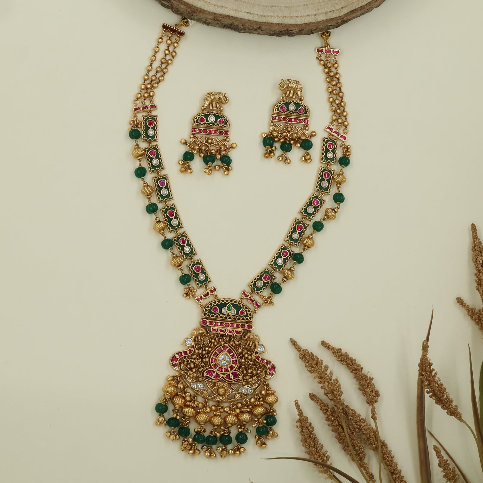 Elephant top kundan beads long haara with panel links and heavy fringe pendant with bead drops