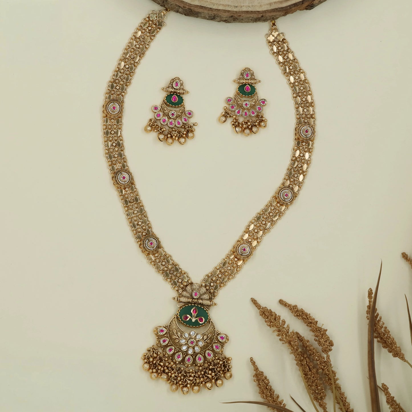 Filigree mesh kundan long haara with dense link pattern and crescent pendant with fringe drops