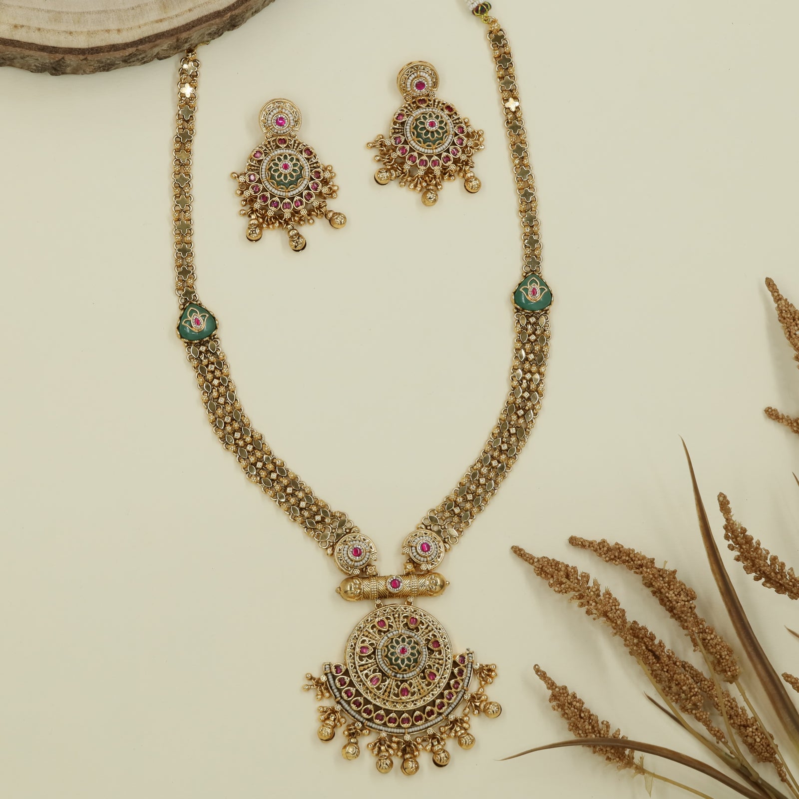 Beaded mesh kundan long haara with clustered chain layers and round drop pendant with dangles