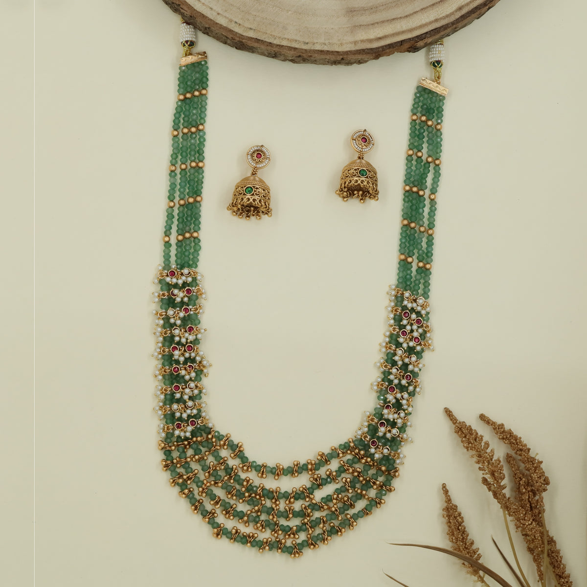 Beaded multi strand long haara with layered rows and clustered drop fringe base