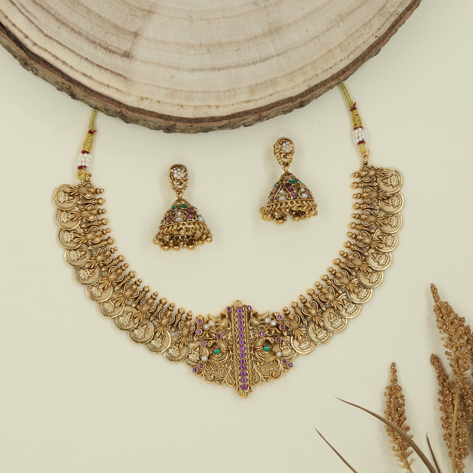 Kasu row antique necklace with repeating coin discs and central bar pendant